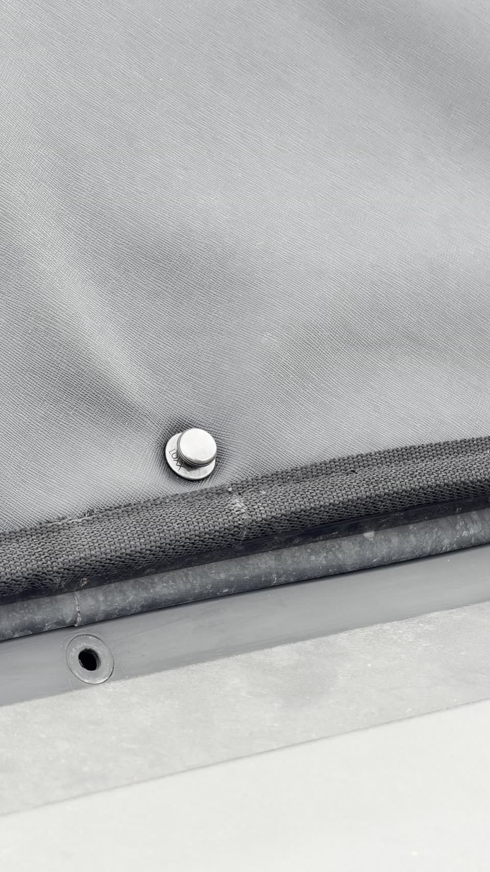 FIT cover locked down on a UTV windshield with the LOXX retention system